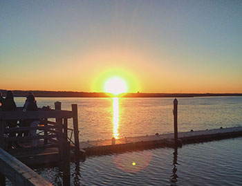 Sunset over the ocean symbolizing peace and heart-centered healing